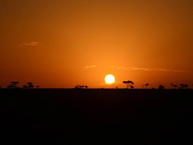 Východ slunce nad NP Serengeti