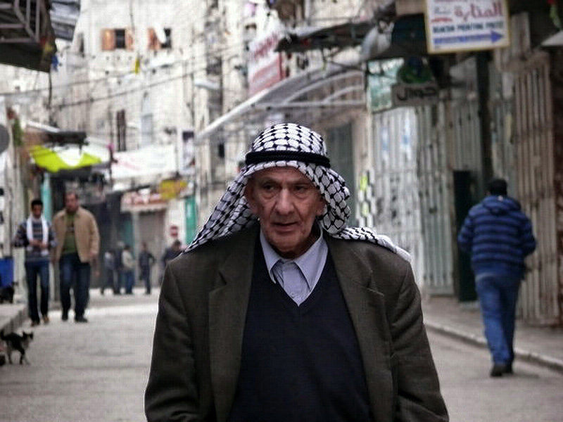 Palestinec s typickým šátkem - kufíjou