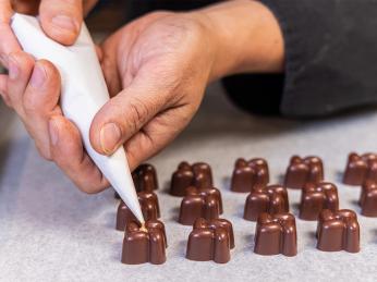 V muzeu Choco-Story je možné se seznámit s postupem výroby čokolády